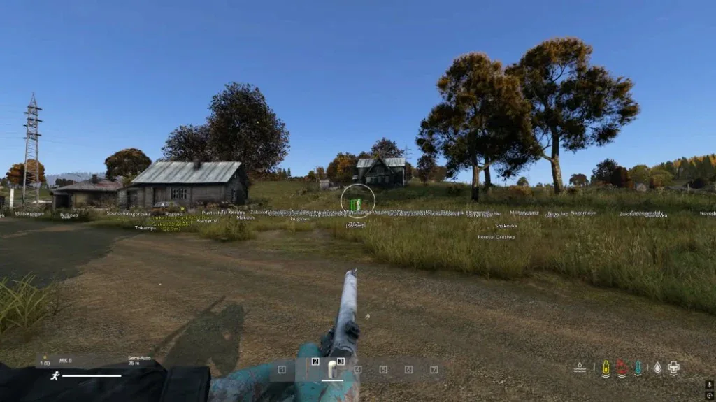 Open field view with a green player outline at long range and white location labels.